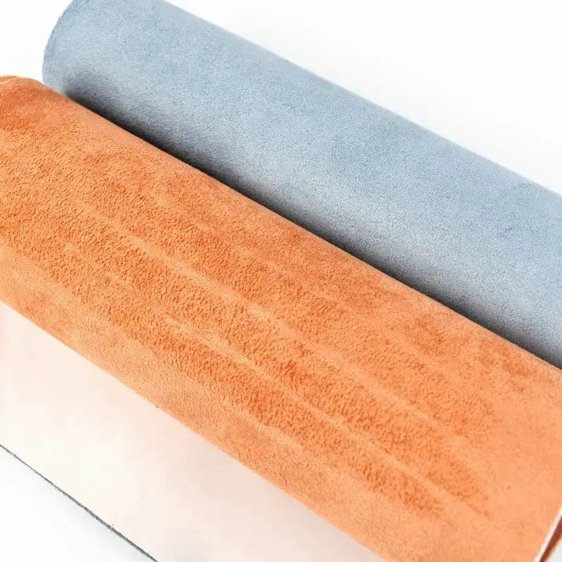 Two rolls of self-adhesive synthetic suede fabric per meter in orange and light blue for car interior and DIY trims