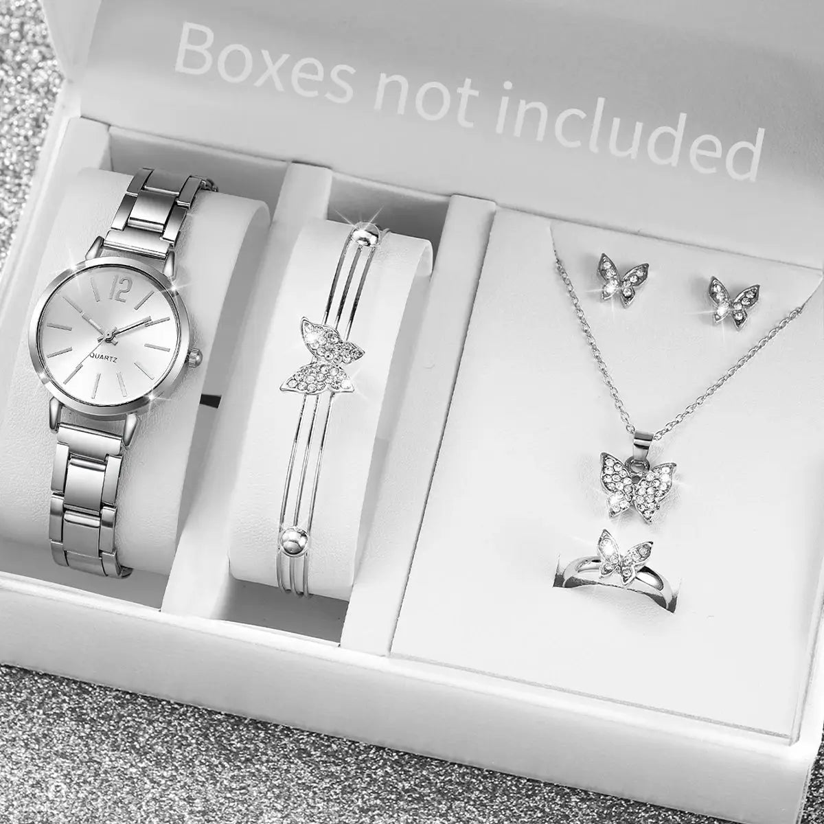 6-piece women's jewelry set with silver-tone stainless steel watch, bracelet, necklace, ring, and butterfly earrings.