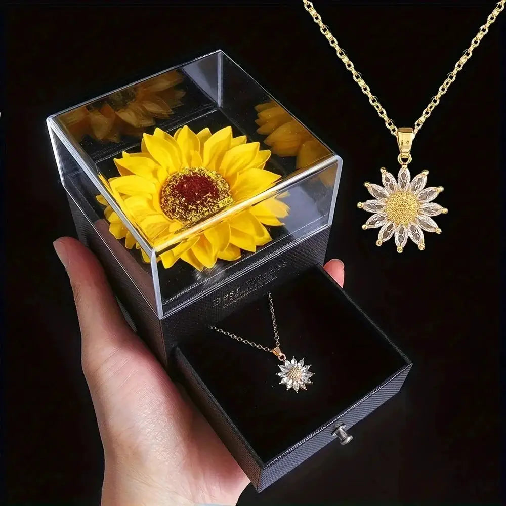 Sunflower necklace gift box; gold-tone chain with sunflower pendant inside a clear display box, two-piece set