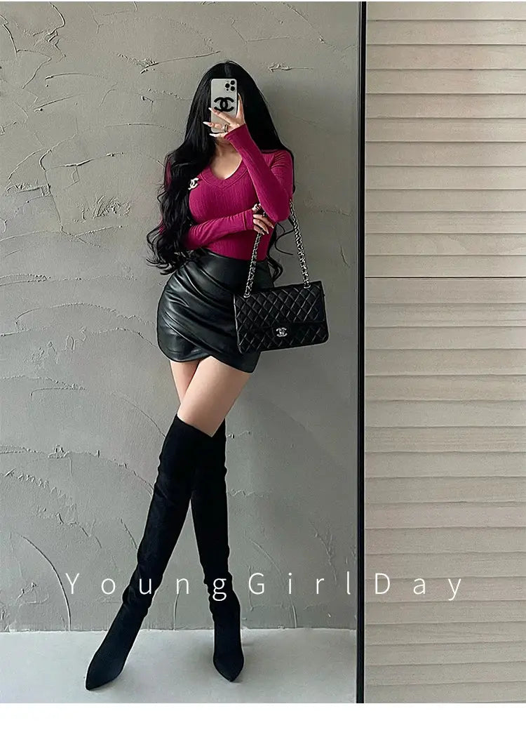 WOMENGAGA black PU leather wrap mini skirt, high-waisted A-line; Chanel quilted bag.