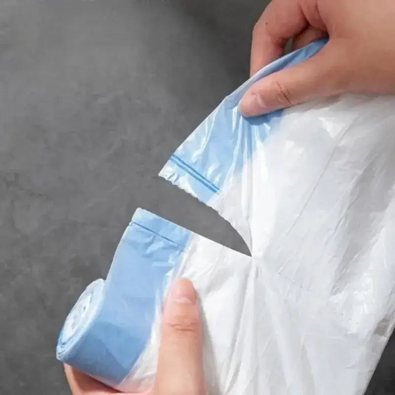 Simples Market blue drawstring trash bags on a roll; thick plastic, large for kitchen or dorm