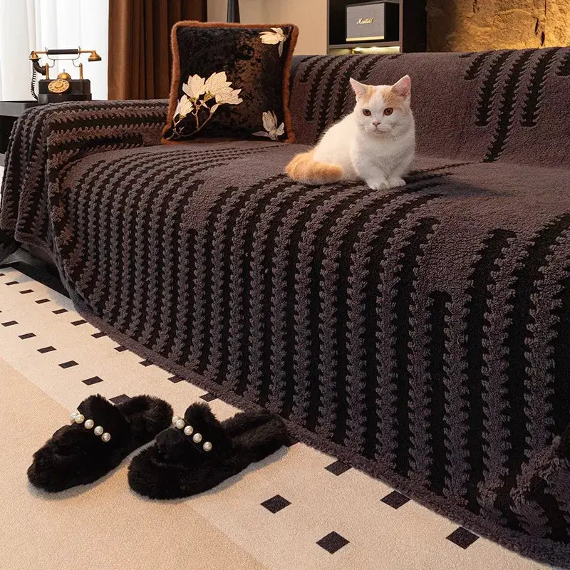 Simples Market thick warm jacquard fleece sofa throw on a dark brown couch with a white cat nearby
