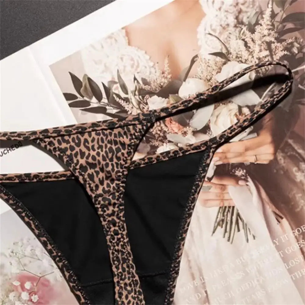 Leopard print thong for women by Simples Market; high-slit, ice silk seamless underwear with black panels.