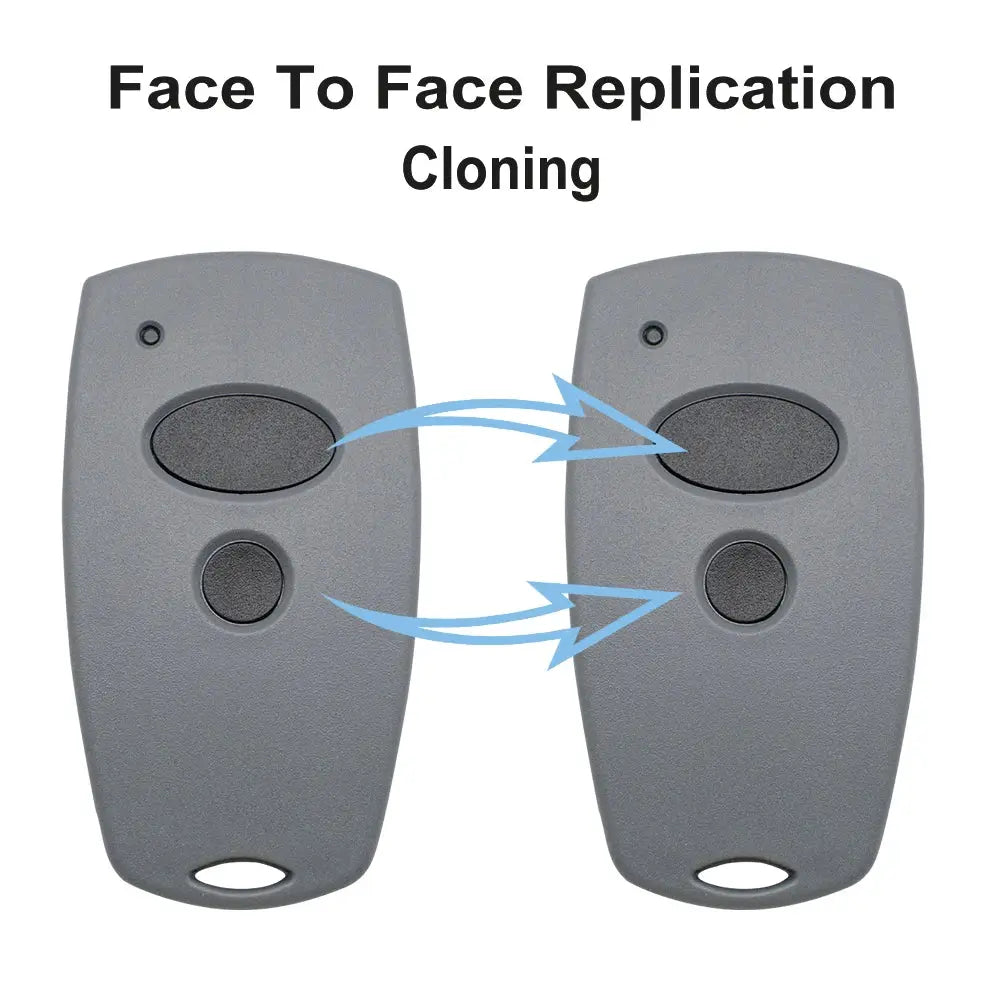 Simples Market garage door remote duplicator set: two gray remotes with black oval buttons