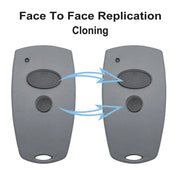 Simples Market garage door remote duplicator set: two gray remotes with black oval buttons