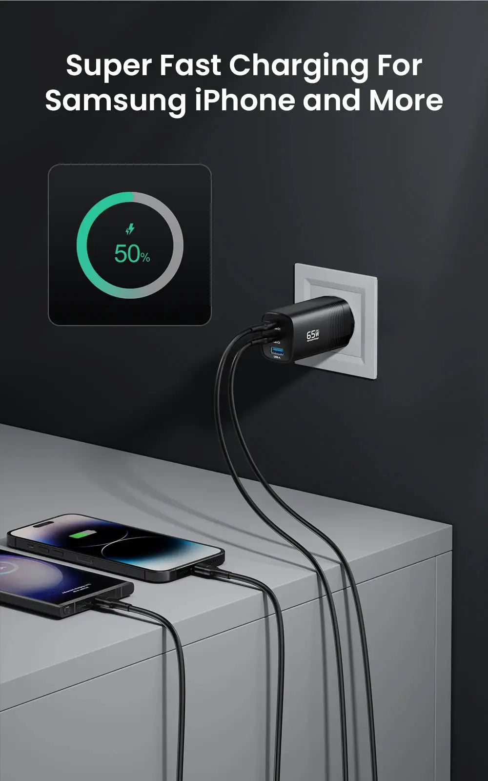 ASOMETECH 65W GaN USB-C charger by Simples Market plugged into wall, charging two smartphones.