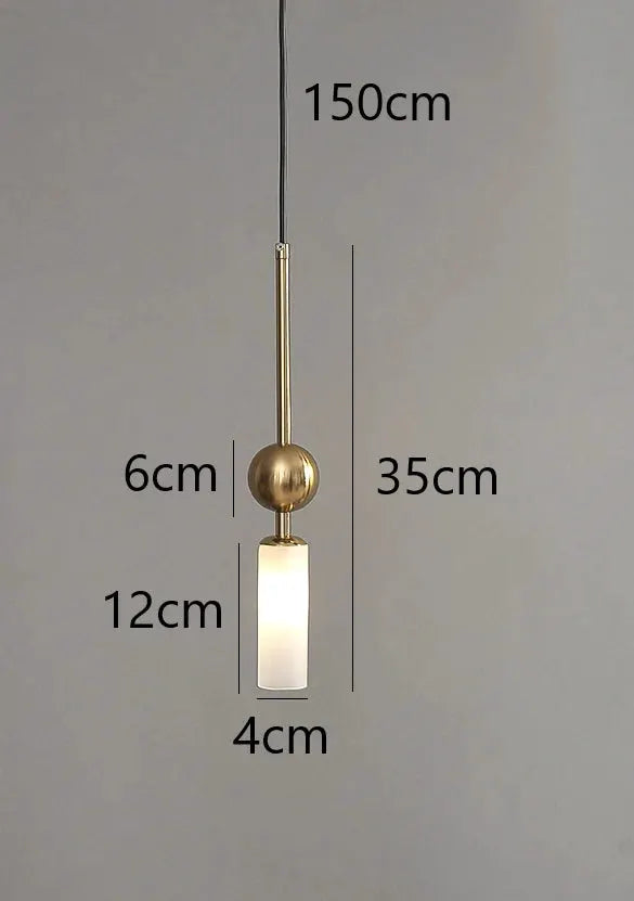 Nordic Light luxury pendant lamp by Simples Market in gold and black iron with glass cylinder LED hanging light