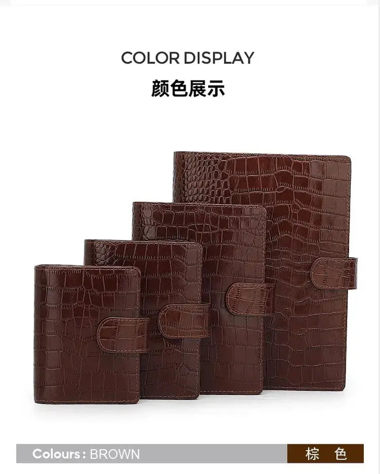 Brown croc-textured genuine leather pocket-size planners, set of four (A8–A5) with strap closures.