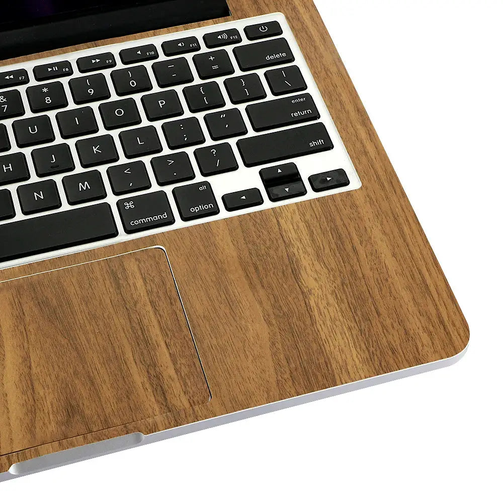 Wood grain PVC self-adhesive vinyl wrap on laptop chassis, brown finish