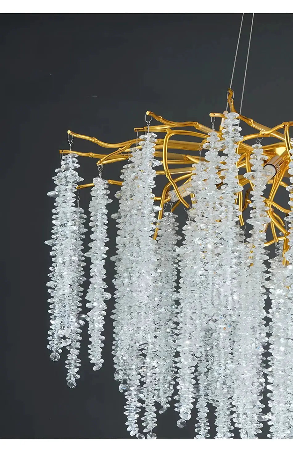 Modern crystal chandelier with gold-toned branches and cascading glass prisms for living and dining rooms