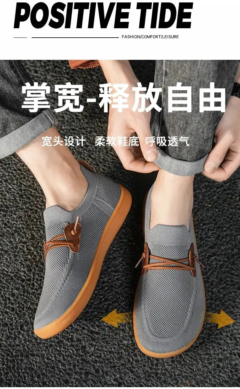 Unisex wide barefoot shoes with grey mesh upper and orange sole, casual breathable minimalist sneakers