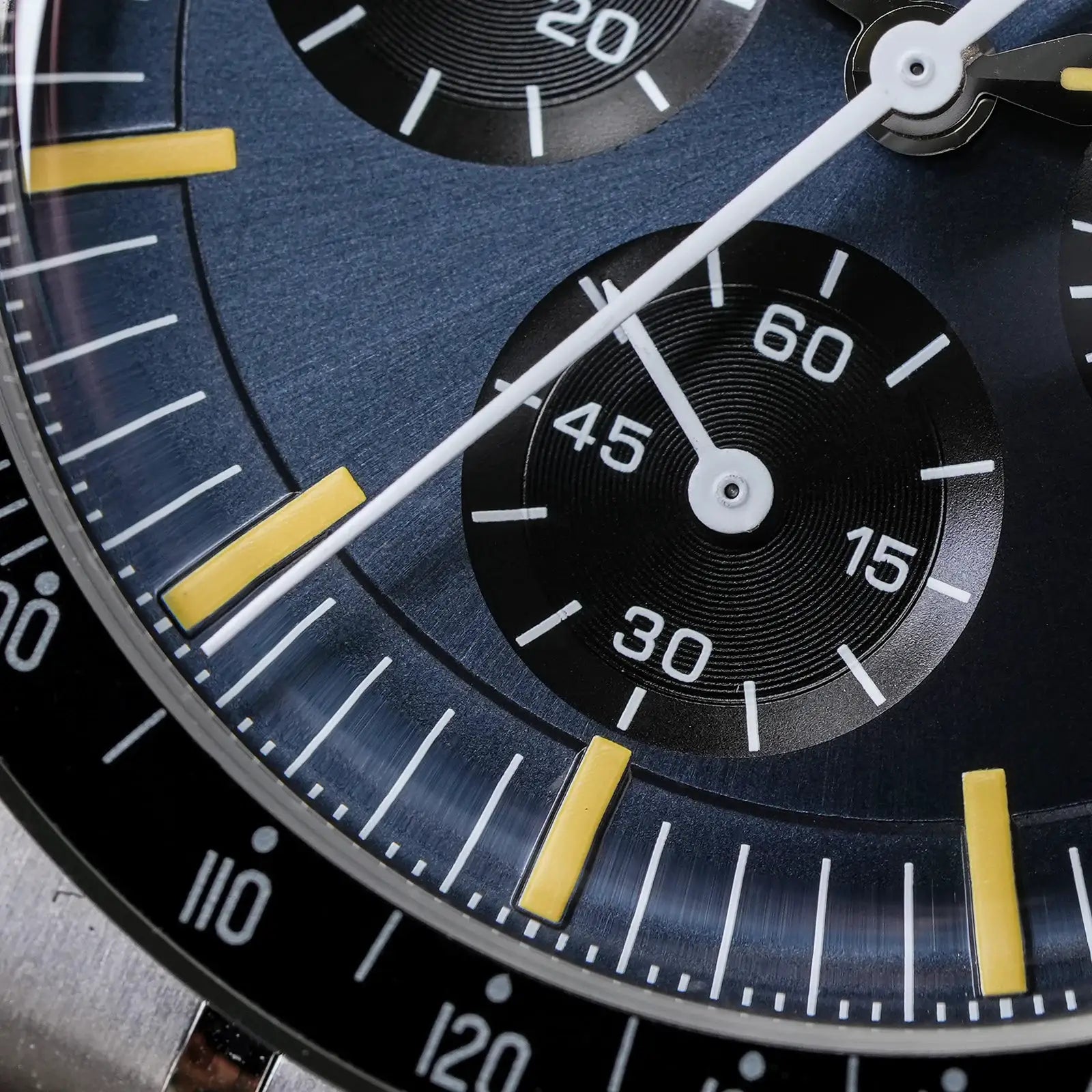 Watchdives WD1863 39mm quartz chronograph watch with blue dial, white hands, and yellow hour markers.