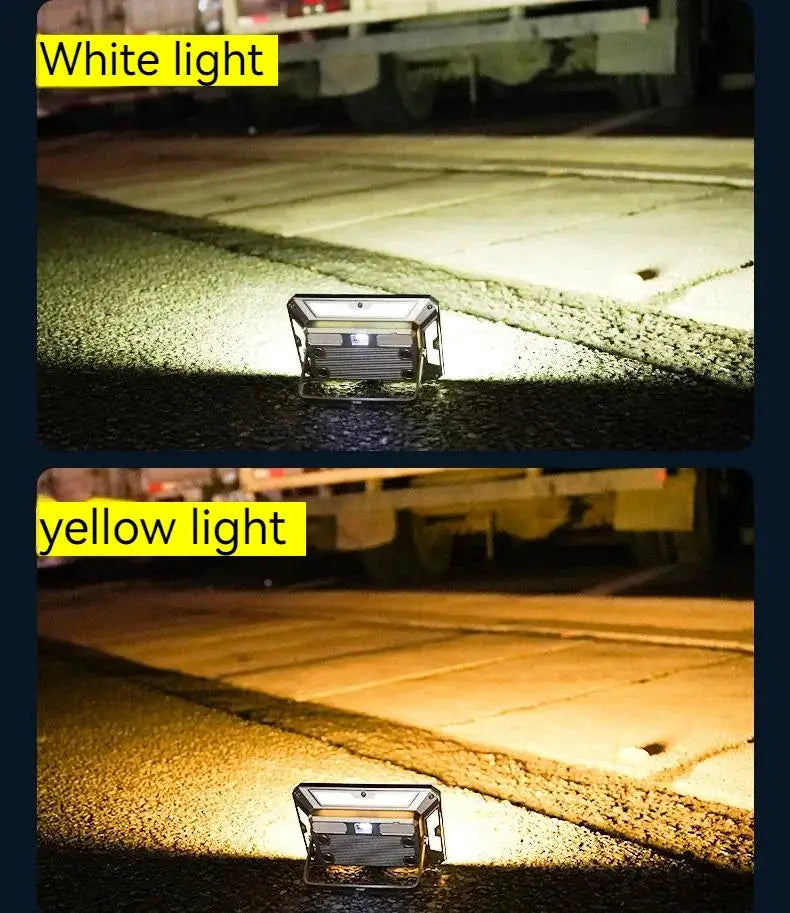Simples Market LED camping tent light; rechargeable portable searchlight with white and yellow light modes on ground.