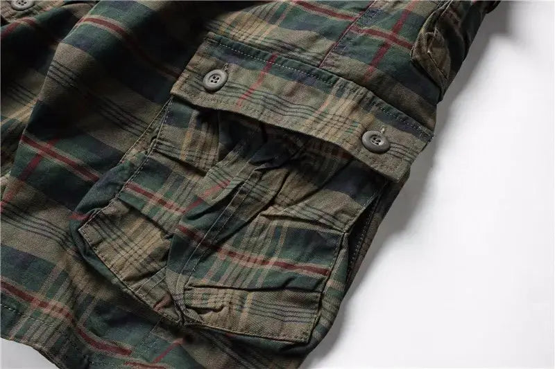 Men's plaid cargo shorts with multiple pockets in green-brown camouflage fabric