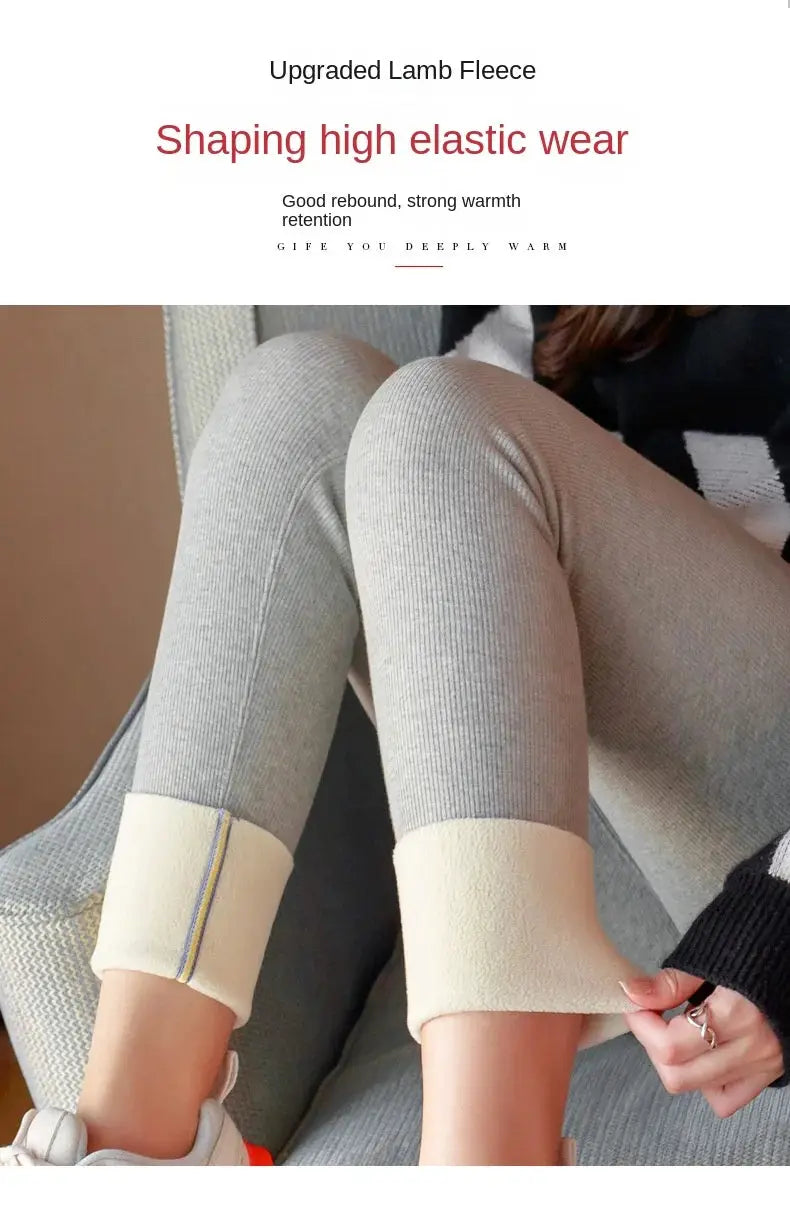 Women's winter warm leggings, grey ribbed knit with beige cuffed ankles; high-waisted thermal pants.