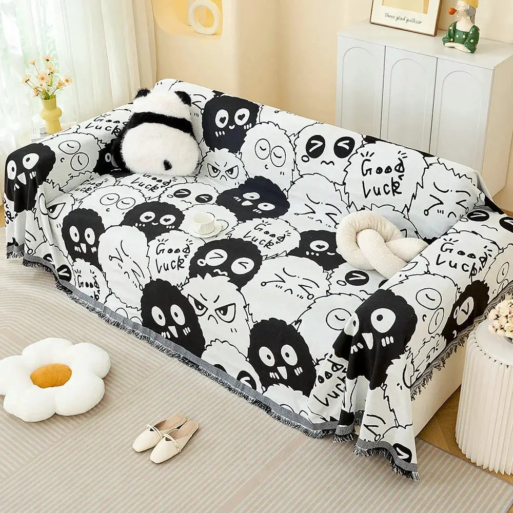 Sofa throw blanket in cream cotton yarn with black panda print by Simples Market