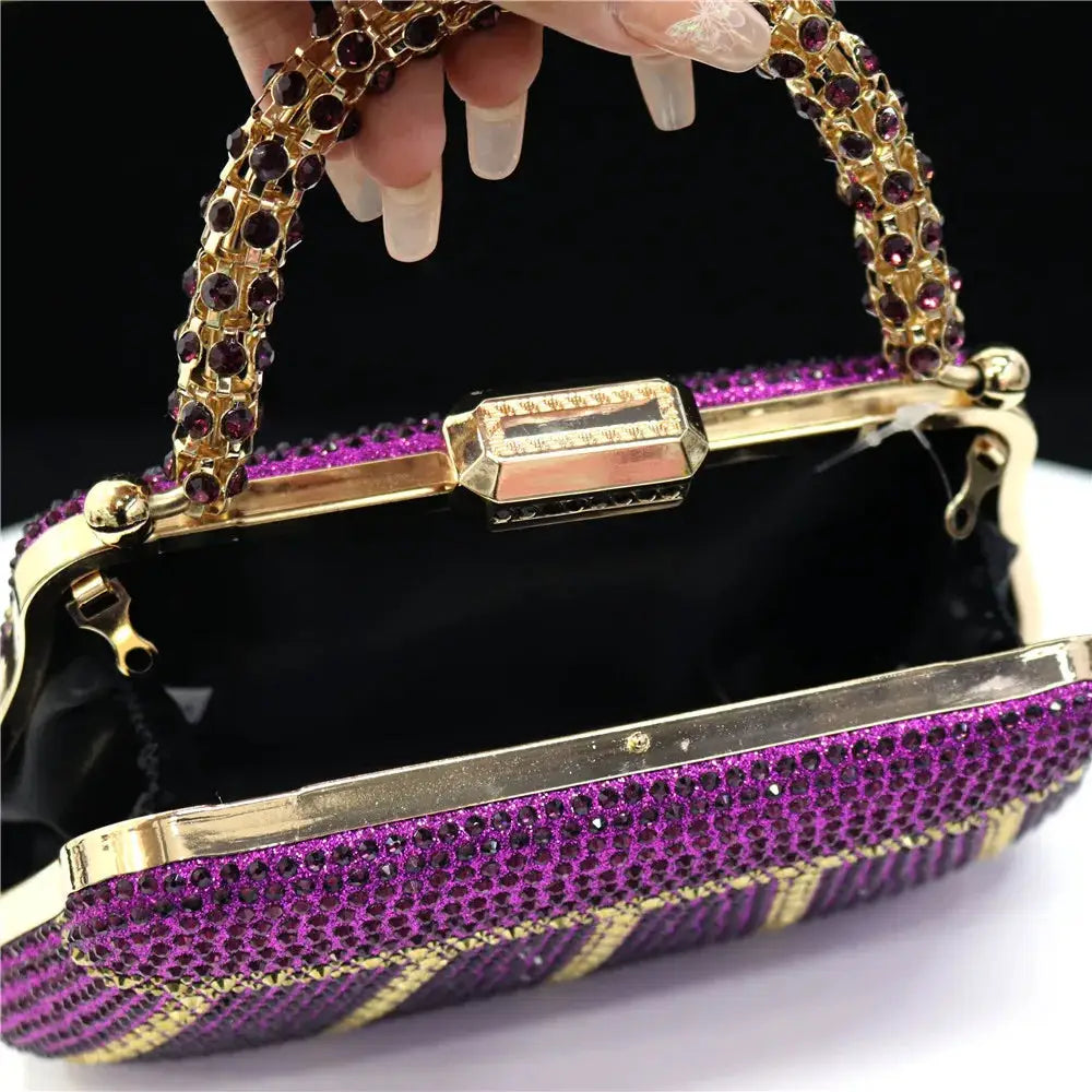 Purple rhinestone evening clutch with gold-tone frame and diamond-studded handle