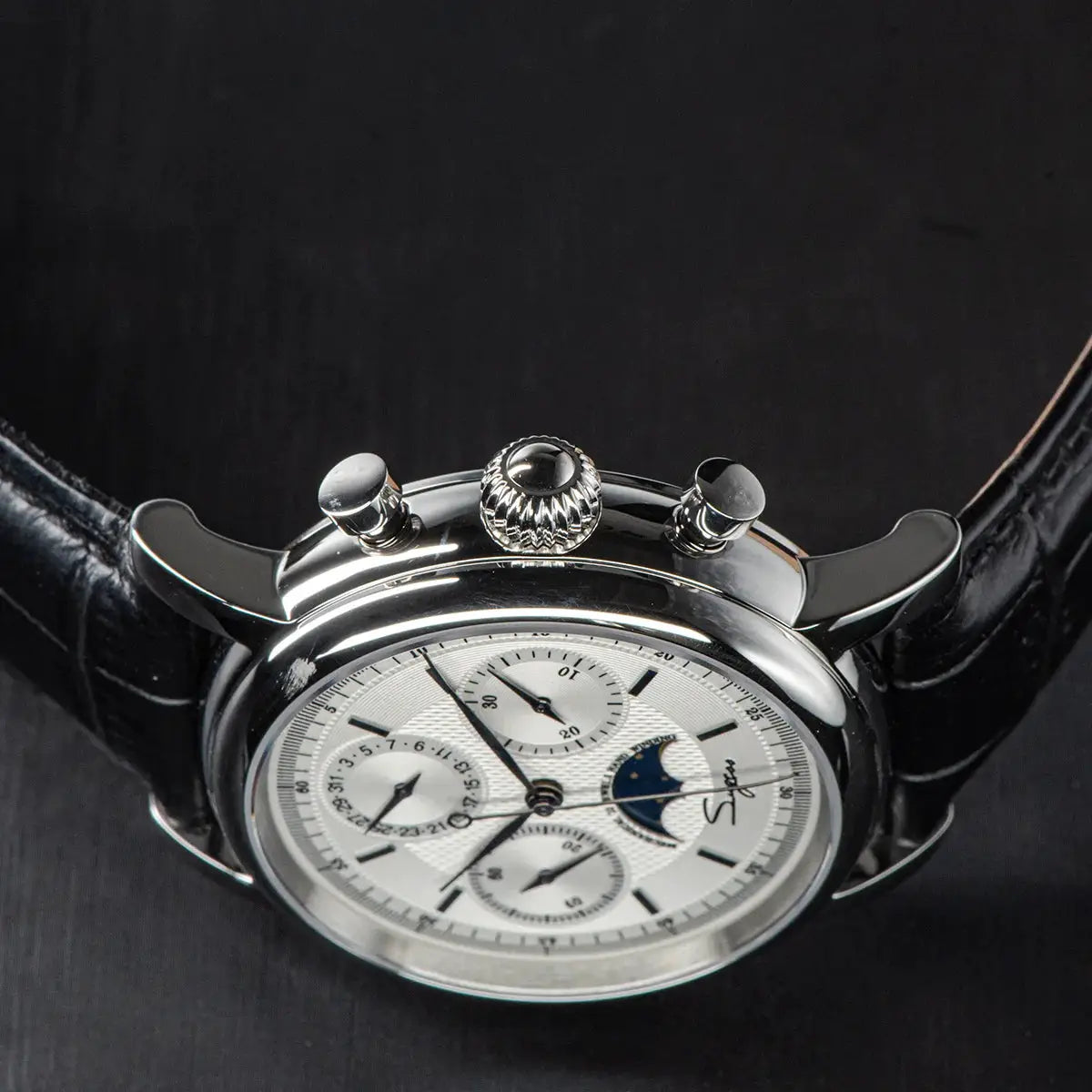 Sugess ST1908 moonphase chronograph wristwatch with silver case and black leather strap