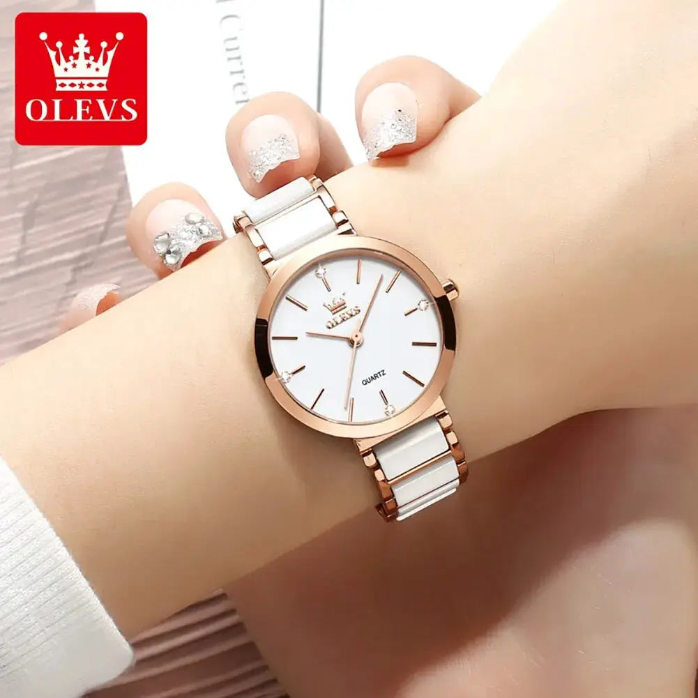 OLEVS women's fashion watch with rose gold case, white dial, and white ceramic strap; quartz