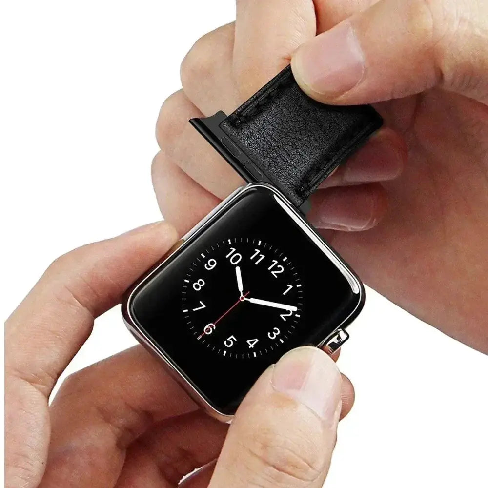 Apple Watch band adapter in black leather being fitted to a silver Apple Watch.