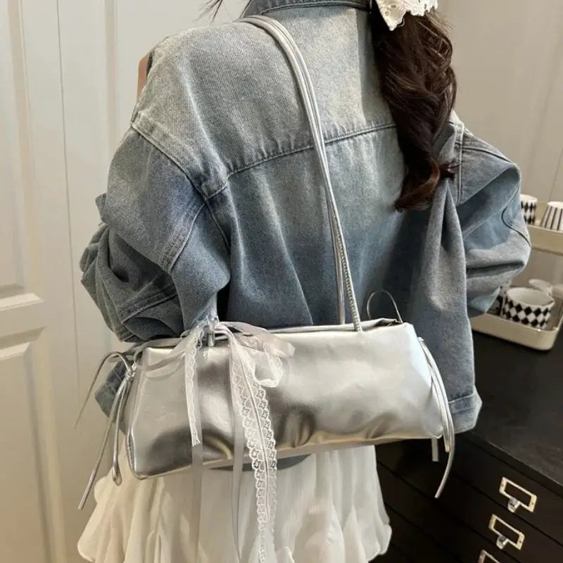 Square PU shoulder bag in silver with lace bow, from Simples Market.