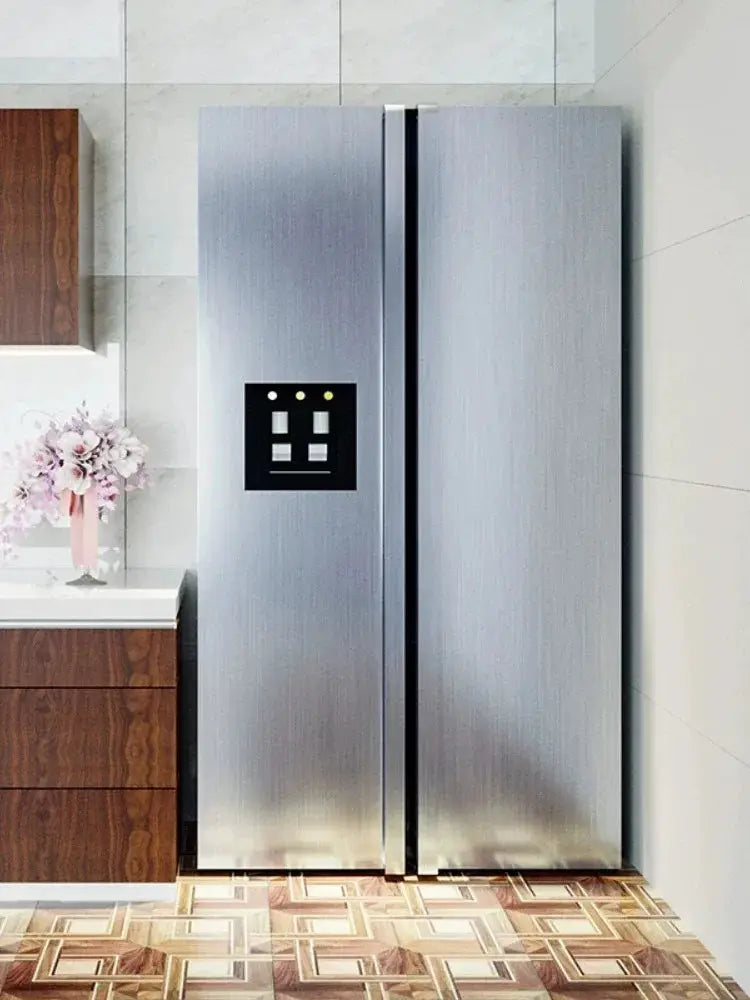 Refrigerator: brushed stainless steel side-by-side in a modern kitchen.