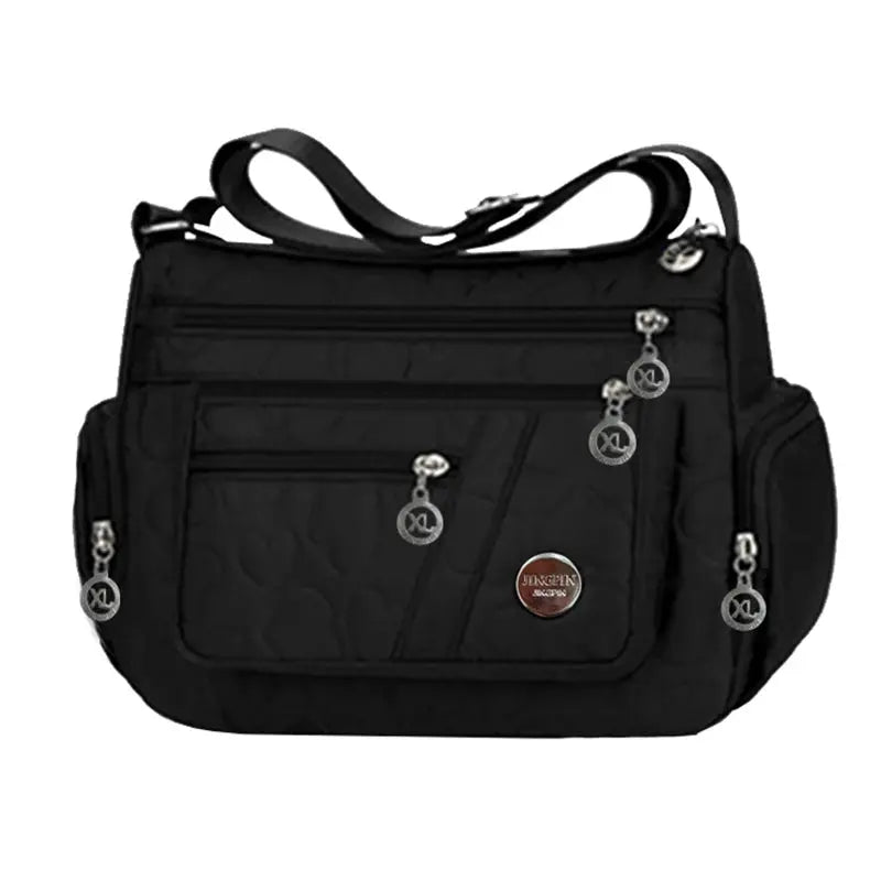 Simples Market black nylon ladies' crossbody bag with multiple compartments and shoulder strap