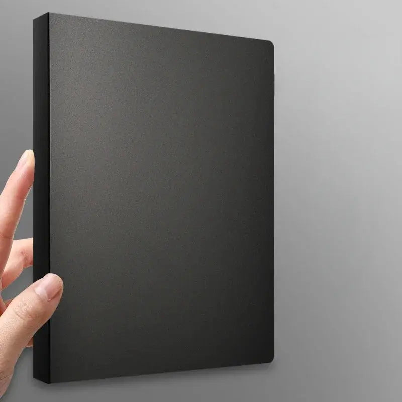 A4 black binder folder with a smooth matte cover, held by a hand.