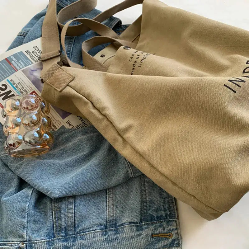 Simples Market beige canvas cross-body bag with thick strap, large capacity