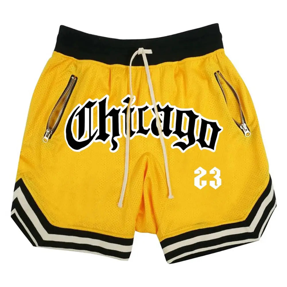 Men's yellow mesh basketball shorts with black waistband, drawstring, zip pockets, Chicago graphic.