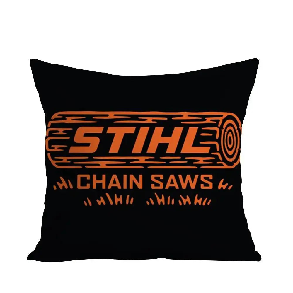 Pillow cover with orange STIHL chain saw log graphic on black, double-sided print.