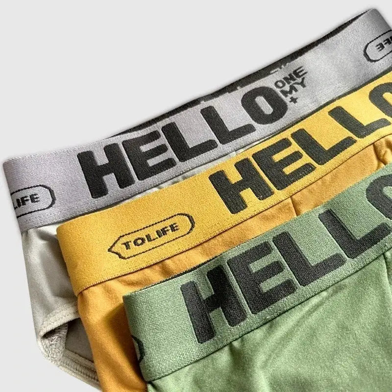 4-pack men's briefs with elastic waistbands in grey, white, yellow, and green from Simples Market