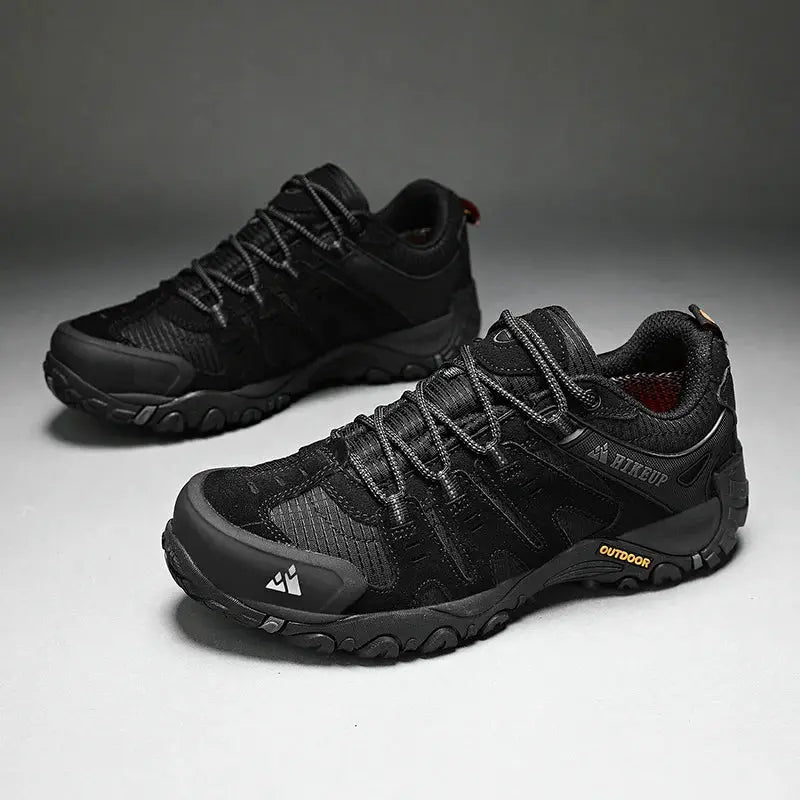 HIKEUP Men's Hiking Shoes in black suede leather, wear-resistant outdoor trekking sneakers; pair shown by Simples Market