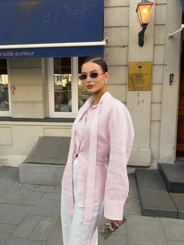 Wolfeel pink 100% cotton belted shirt cardigan worn by a woman on a city street