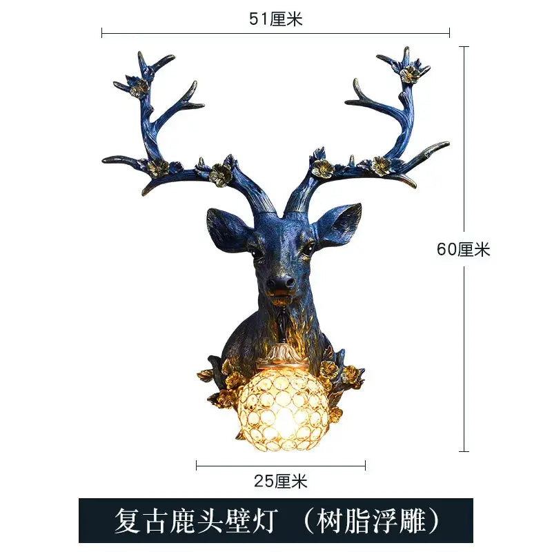 Lucky Deer wall lamp by Simples Market in blue resin with floral antlers and glowing honeycomb bulb