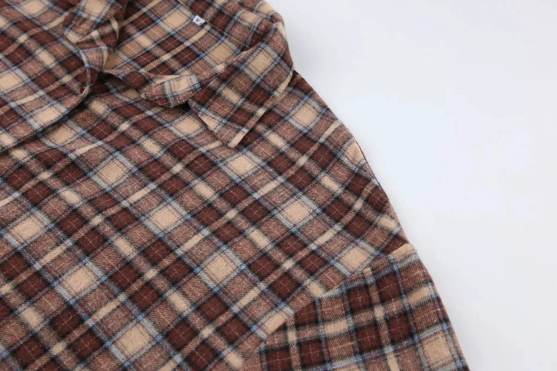 Women's vintage plaid shirt in brown and tan with blue checks, long sleeves, loose fit