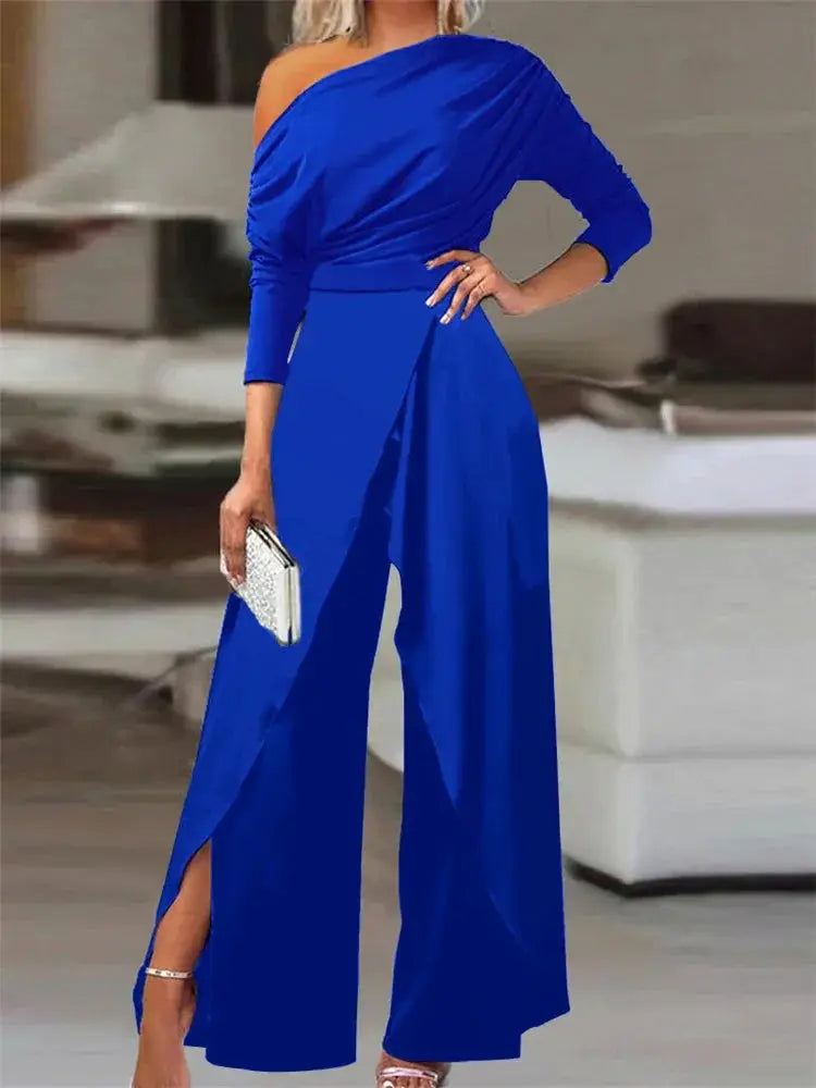Blue one-shoulder jumpsuit by Simples Market with ruched top and wide-leg split-hem pants
