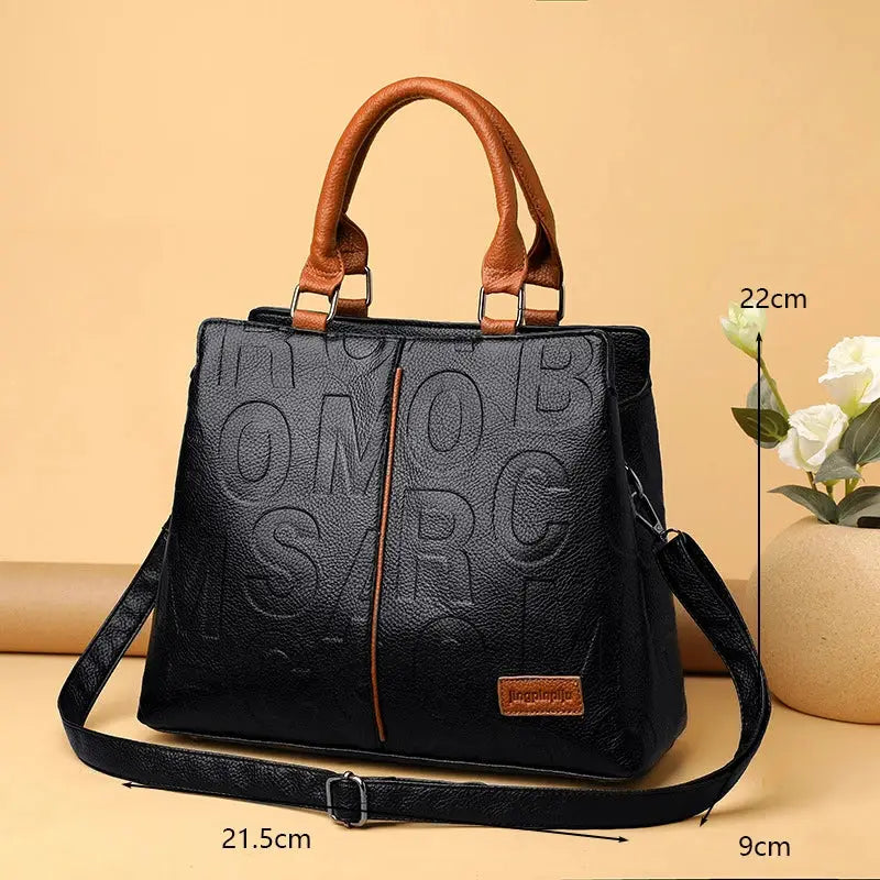 Simples Market PU leather crossbody bag for women, black with brown handles, embossed pattern, adjustable strap