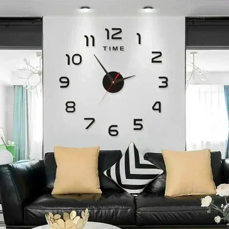 Digital clock wall sticker with large black numerals on a white wall above a black sofa in a living room