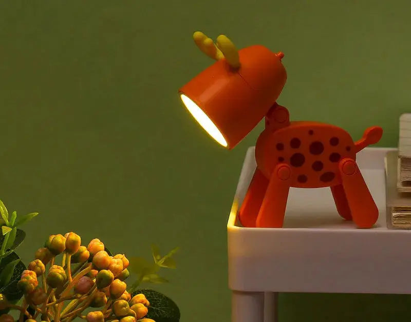 Mini LED night light in orange deer-shaped folding desk lamp, suitable for kids' bedrooms.