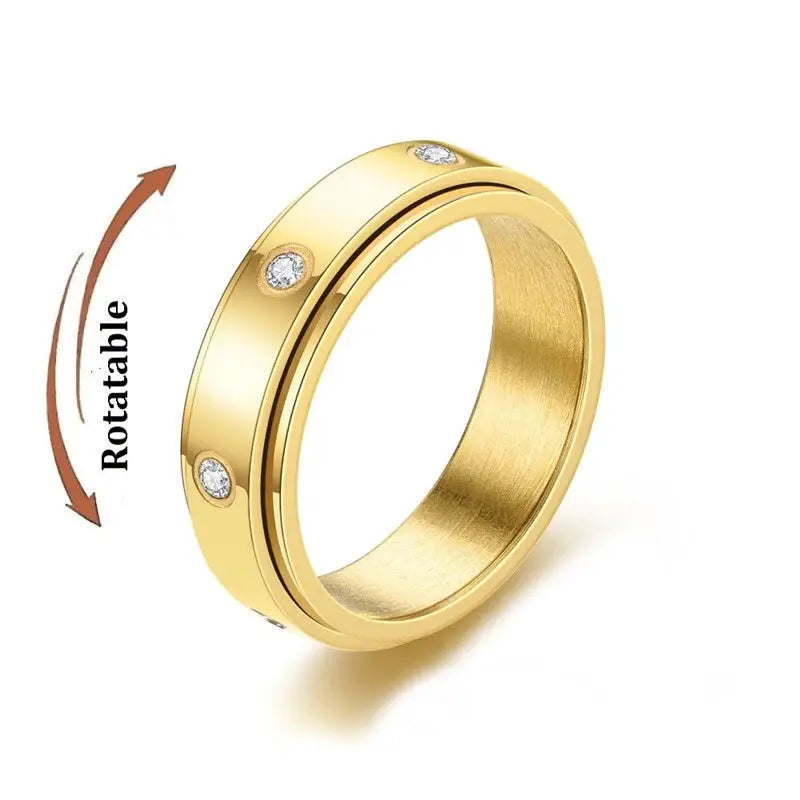 Gold-tone stainless steel rotating knuckle ring with crystal inlays
