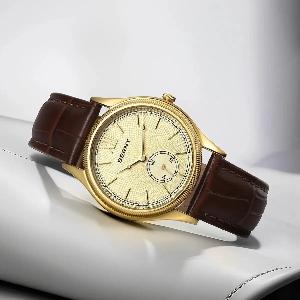 BERNY luxury men's watch with gold-tone case, textured gold dial, brown leather strap