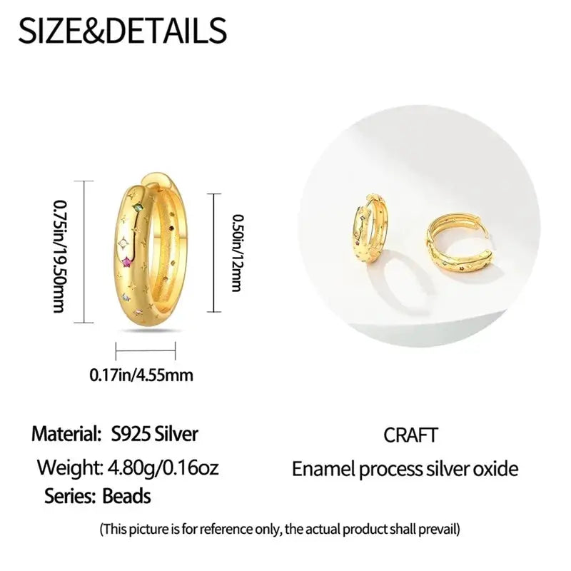 Classic gold-tone hoop earrings by Simples Market with star and moon crystal accents (pair)