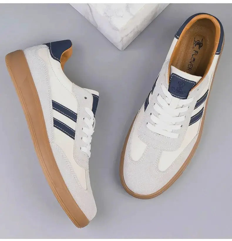 Pair of Simples Market leather sneakers for men, white with navy stripes, brown sole