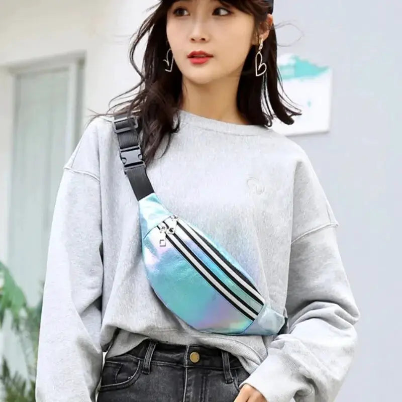 Holographic fanny pack by Simples Market, iridescent waist bag with black-white stripes worn crossbody
