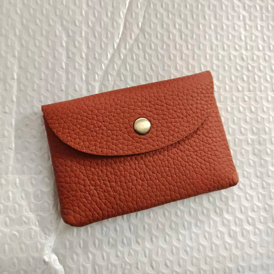 Personalize Genuine Leather Card Holder by Simples Market in red cowhide with envelope-style curved flap and brass snap