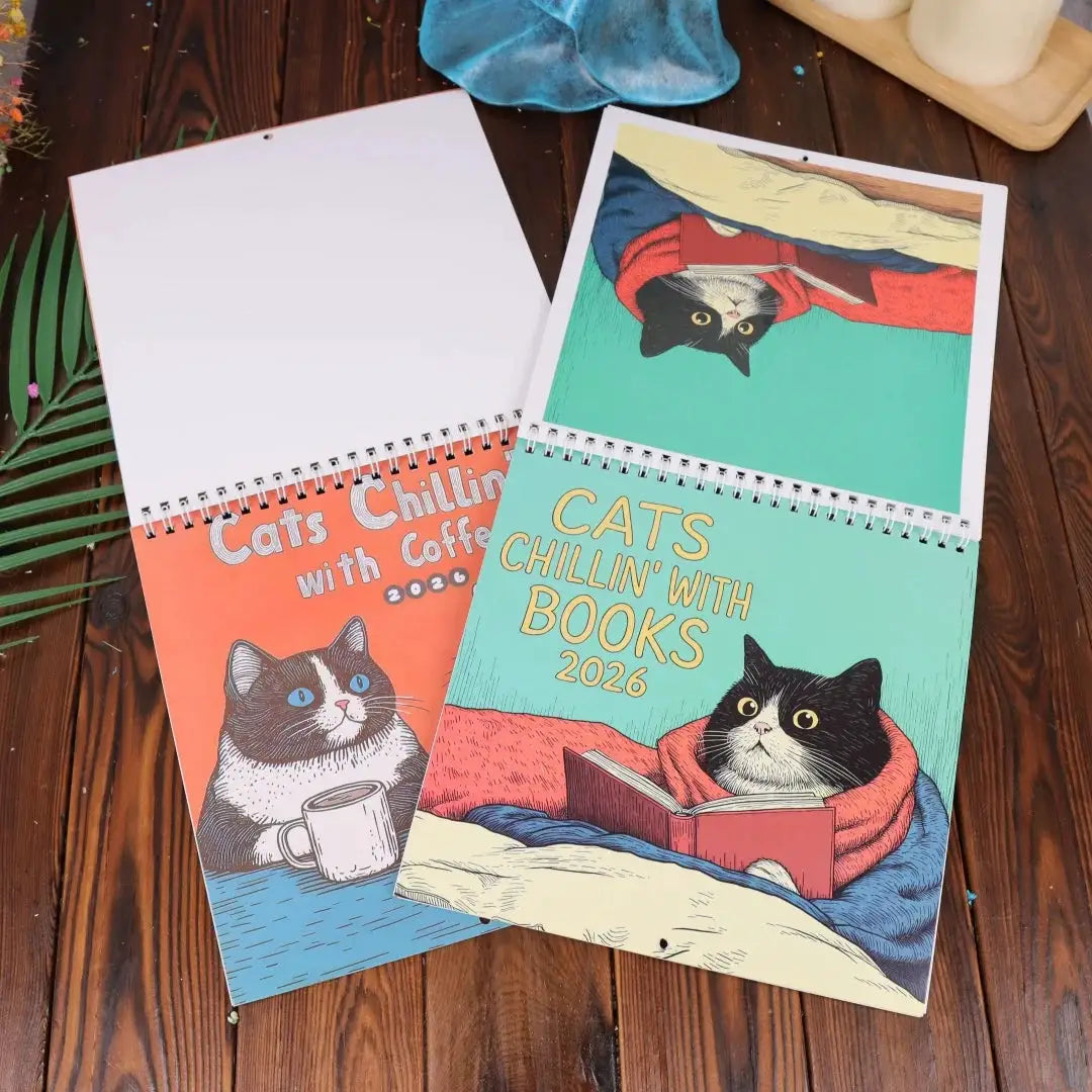 Creative Family Planner 2026 cat art calendar set: three spiral-bound calendars with colorful cat illustrations.
