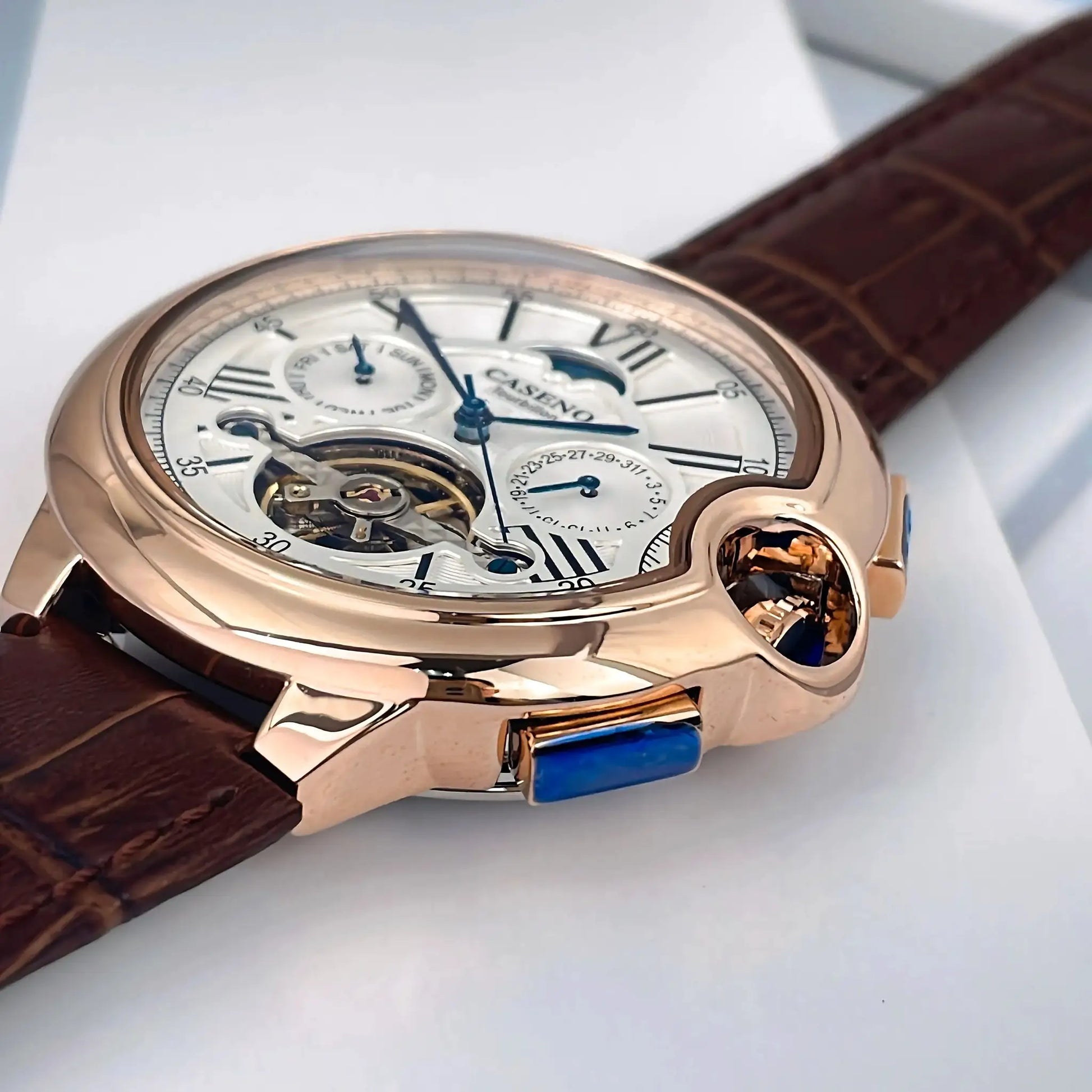 CASENO Star Roman Grand men's rose-gold automatic tourbillon wristwatch with blue hands and brown leather strap