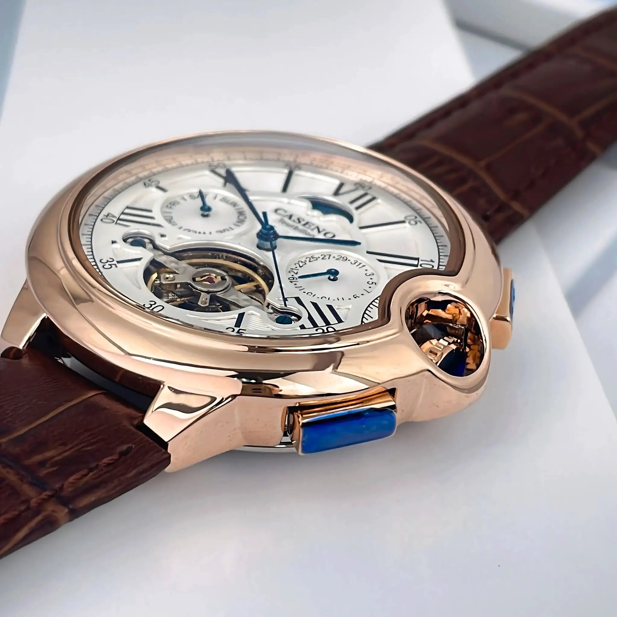 CASENO Star Roman Grand men's rose-gold automatic tourbillon wristwatch with blue hands and brown leather strap