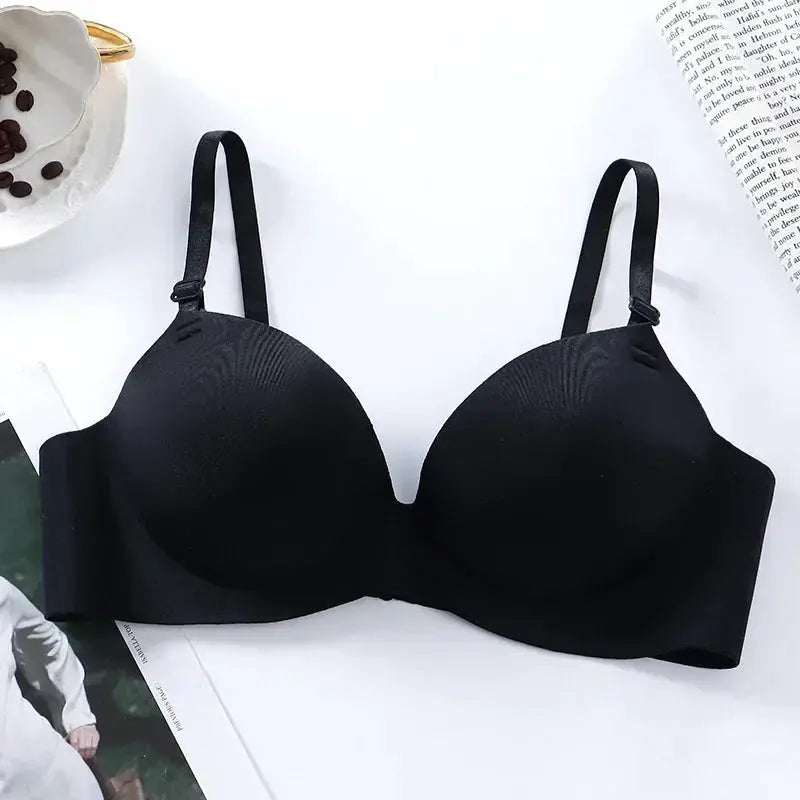 Women's seamless wireless padded bra in black with adjustable straps